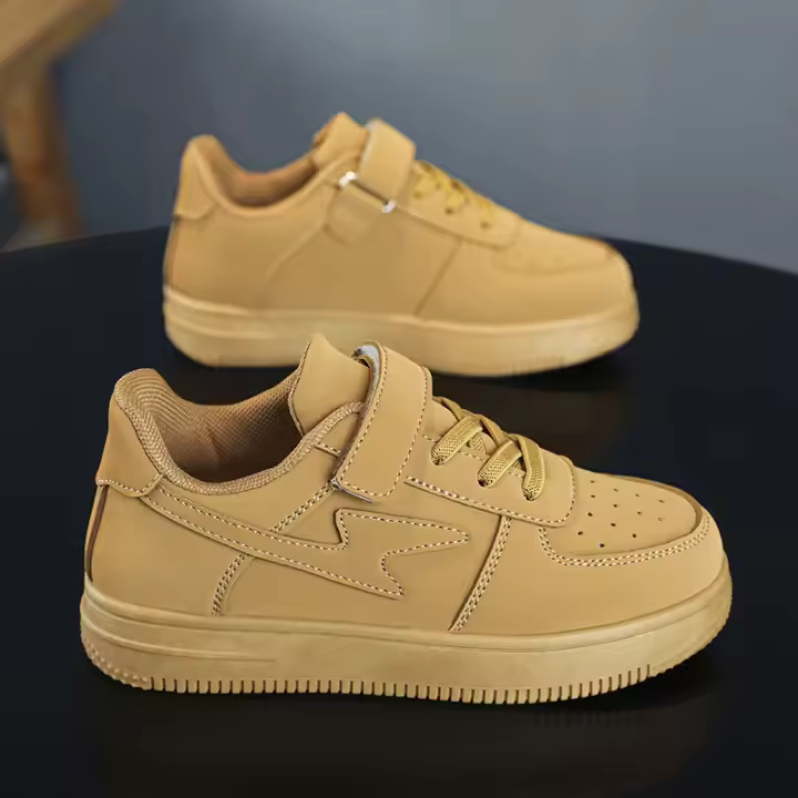 Zapatos de tablero para niños Niños Primavera y otoño 2025 nuevos zapatos blancos impermeables de cuero suela suave ligera. - 1
