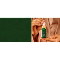 Close up of woman’s hands holding Retinol serum