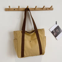 Bolso de mujer de lona de gran capacidad bolso de mano bolso de hombro estudiante universitario bolso versátil bolso de viaje multibolsillo - details 8