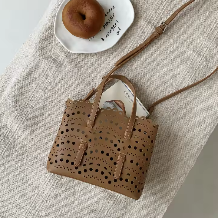 Nuevo estilo de mujer tallada hueca, bolso de cesta cruzado de alta gama a la moda para el trabajo - 1