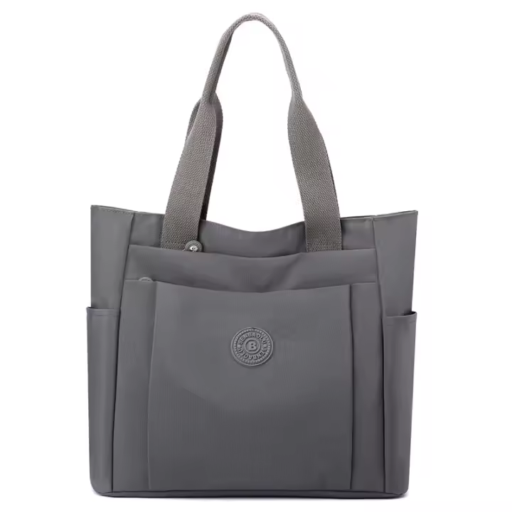 Casual bolso de las mujeres 2025 verano nueva moda de gran capacidad casual color sólido tela de nylon hombro portátil madre bolsa - 1