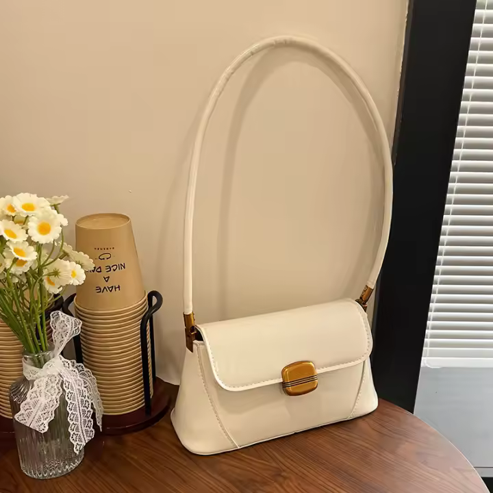 Bolsos para mujer 2025 primavera nuevo popular versátil casual moda de mano de un solo hombro nicho negro bolso de axila - 1