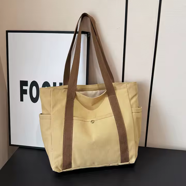 Bolso de mujer de lona de gran capacidad bolso de mano bolso de hombro estudiante universitario bolso versátil bolso de viaje multibolsillo - 1