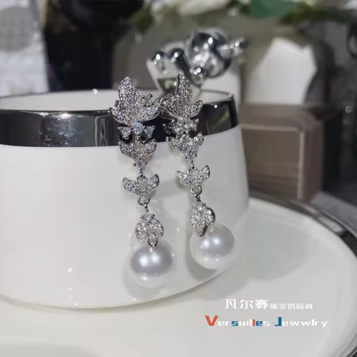 Pendientes de perlas con lazo francés para mujer, borlas de nicho chapadas en oro, temperamento de hada, pendientes largos, estilo frío - 1