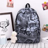 Mochila escolar de gran capacidad con grafiti para estudiantes, mochila informal de moda para mujer, mochila escolar con colgante de dibujos animados para niña que se desplaza - details 4
