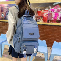 Mochila de gran capacidad de color puro, impermeable, multifuncional, bolso escolar para estudiantes, mochila de nylon para adol - details 2