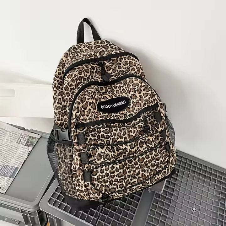 Mochila retro coreana estilo Hong Kong para estudiantes, mochila escolar con estampado de leopardo, gran capacidad, original, de lona. - 1