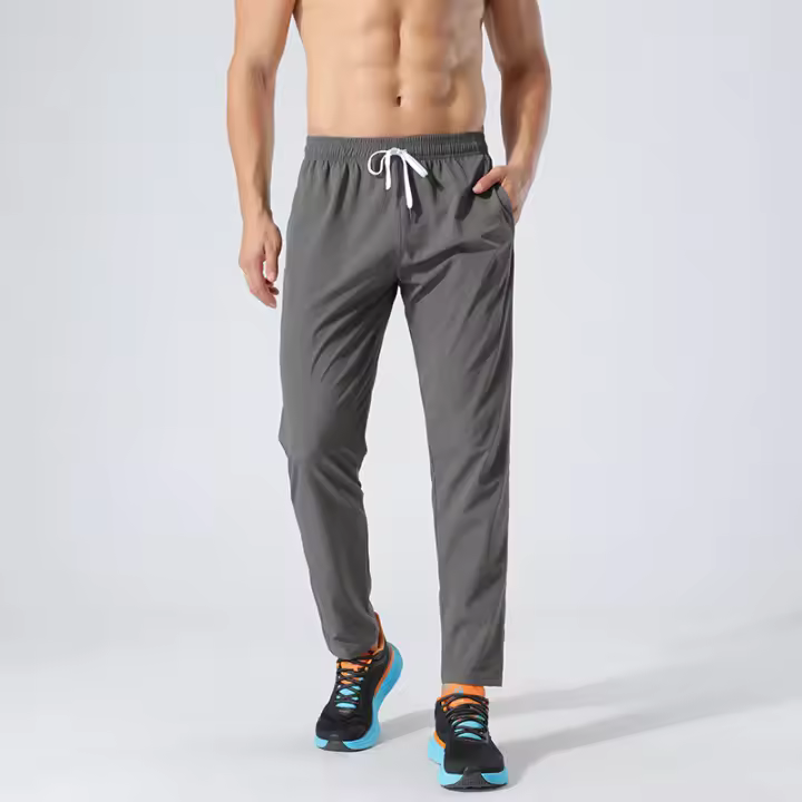 Pantalones deportivos delgados y ligeros con bolsillos de secado rápido - 1