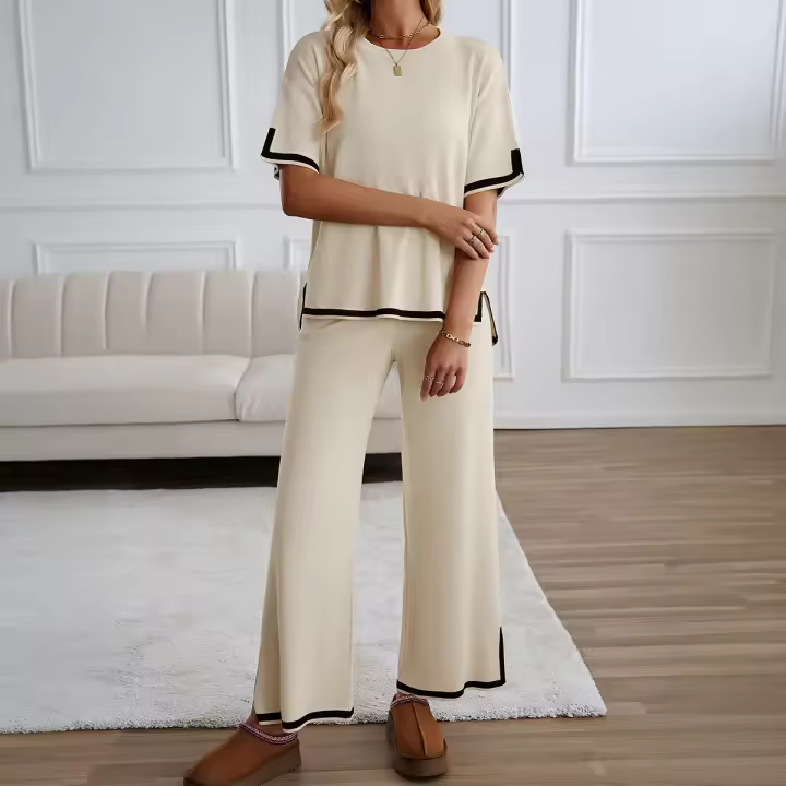 Ropa de mujer de moda 2025 primavera y verano temperamento casual de manga corta conjunto de pantalones de punto. - 1
