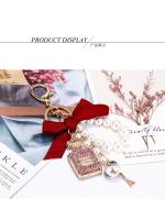 Llavero de Perfume de Perlas de Imitación Accesorio de Bolso para Mujeres Llavero Creativo con Lazo - details 2