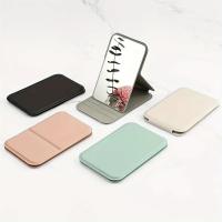 Espejo de maquillaje plegable portátil de 4,25x2,76 pulgadas, espejo de viaje pequeño de pie y de mano para mujer de escritorio de bolsillo Simple, 1 unidad - details 0