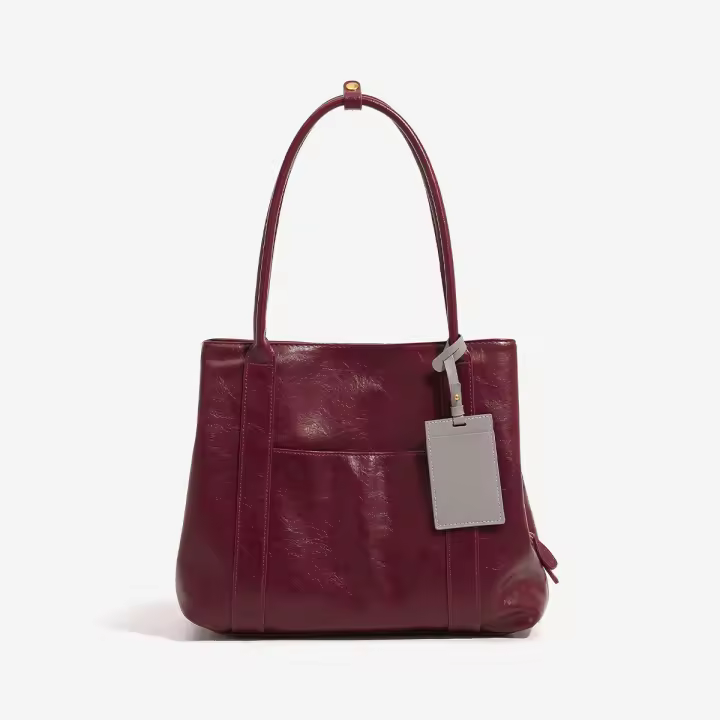 Bolso de mano de cuero suave, nuevo bolso de hombro de gran capacidad para estudiantes universitarios que viajan, bolso de nicho con textura. - 1