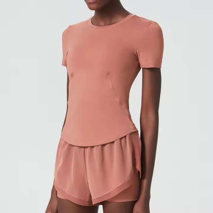 Conjunto deportivo de dos piezas para mujer, ropa deportiva corta de Color liso, transpirable, secado rápido, traje para correr - 1