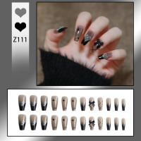 Uñas postizas con patrones negros y estrellas ideales para principiantes en Nail Art - details 5