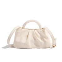 Bolso 2025 nueva moda de moda redonda perla portátil plisado nube bolsa nicho temperamento hombro bolsa de mensajero - details 5