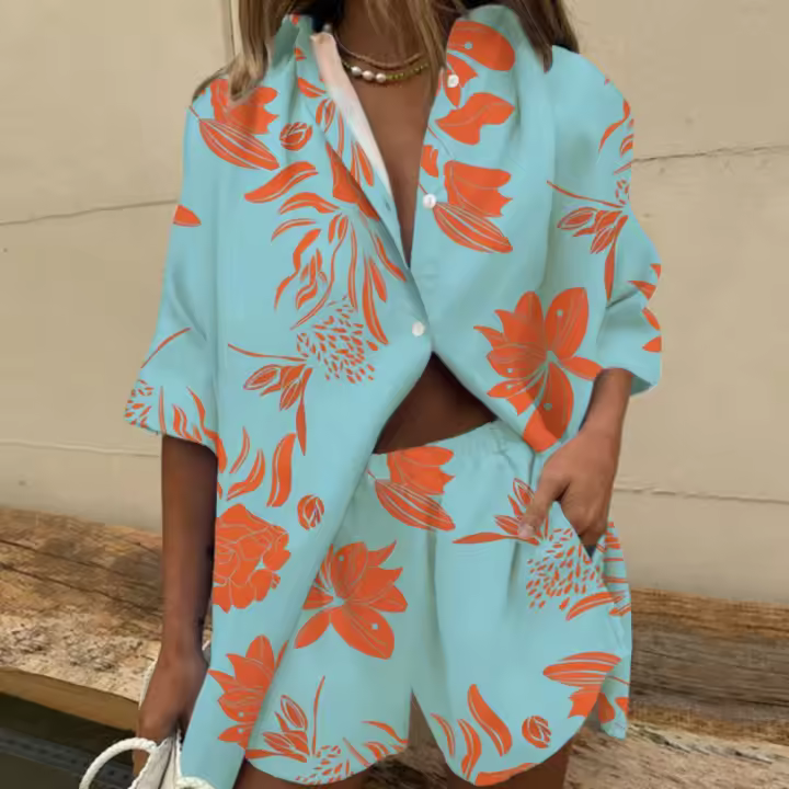 Conjunto de verano 2025 para mujer, blusa tipo camiseta con estampado floral y shorts holgados. - 1