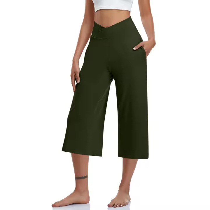 2024 primavera y verano mujeres elástico cintura alta 3/4 pantalón sólido Casual ajuste activo pantalones de pierna Capris anchos pantalones con bolsillos - 1