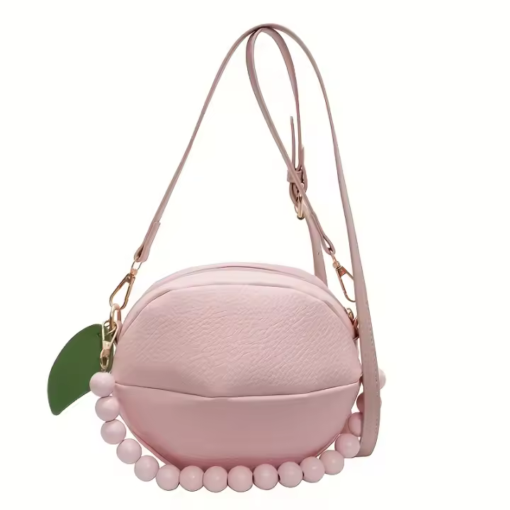 TQNORYCDIL Bolso bandolera con estampado de limones para mujer - Bolso de hombro redondo pequeño sintético amarillo y rosa con cierre de cremallera, forro de poliéster para atuendos casuales y formales, bolso bandolera, accesorio de moda, diseño divertido - 1