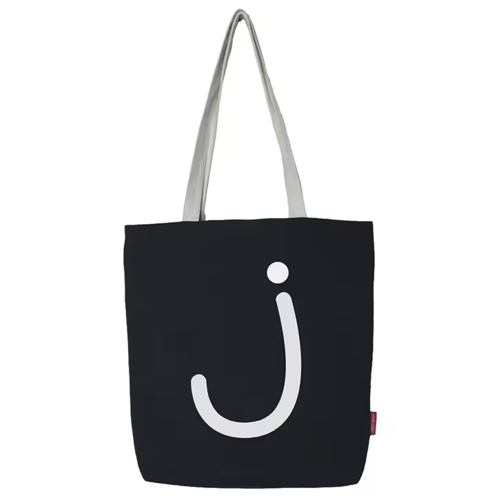 Bolso tote con cremallera, forro y bolsillo interior. Exterior: Algodón 100%. Incluye sobre de regalo de papel kraft. Color: Crudo / Negro. Medidas: 37x38 cm. - 1