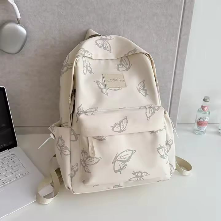 Mochila de mariposa de estilo japonés para niñas de secundaria, mochila escolar para estudiantes, mochila ligera de viaje de gran capacidad - 1