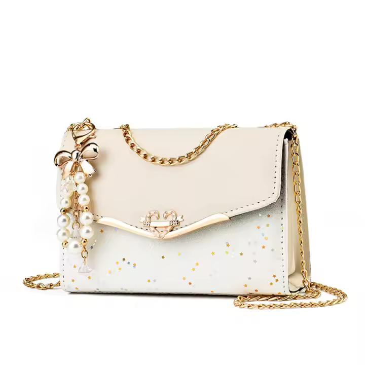 Bolsos de señora cruzados con dijes, bandoleras - 1