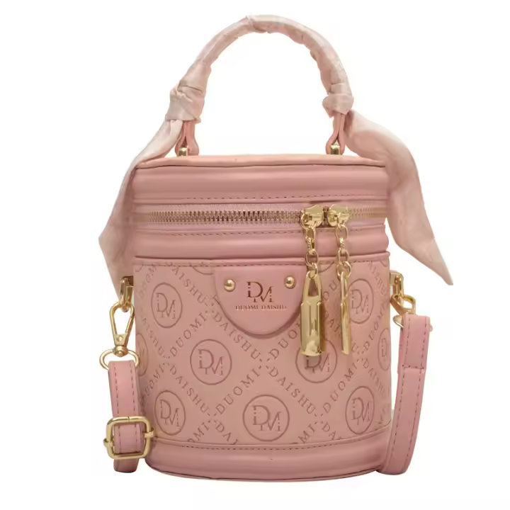 Textura de color sólido pequeña bolsa mujer 2025 nueva moda nicho portátil redondo cubo bolsa popular bolsa de mensajero - 1
