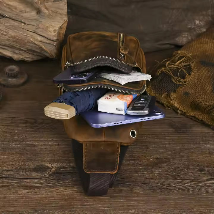 [Luxo diario] Bolso de pecho de cuero genuino para hombre: elegante bandolera de cuero marrón con correa ajustable, múltiples compartimentos con cremallera y diseño espacioso para uso diario - 1