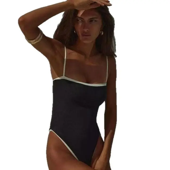 Traje de baño de una pieza blanco y negro 2025 que combina con el color - 1
