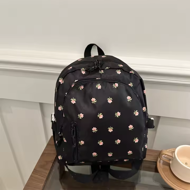 Mochila Escolar Estilo Coreano Material de Nylon Estampados Lindos Nueva Estilo para Estudiantes de Primaria - 1