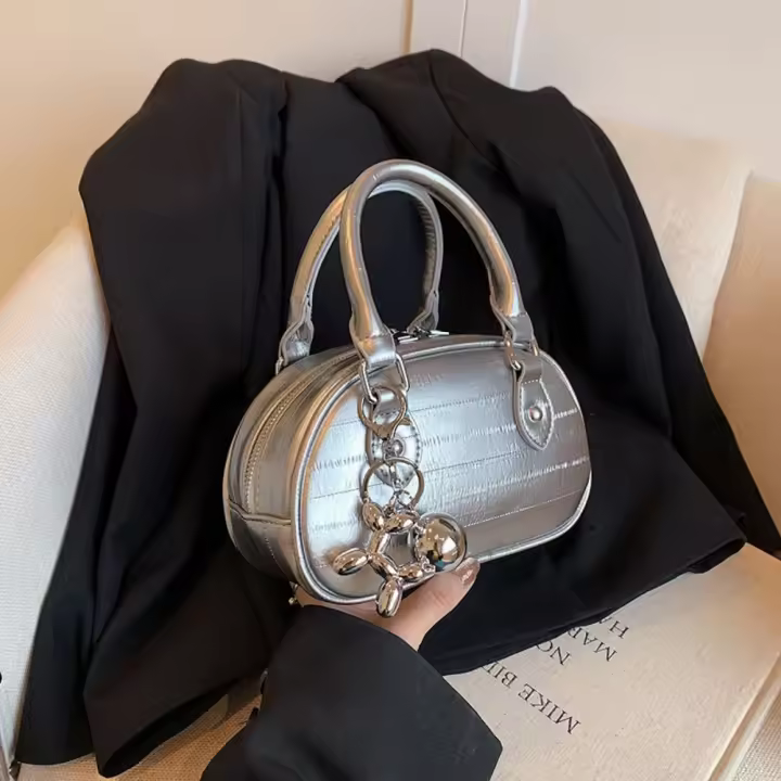 Bolso pequeño plateado de gama alta para mujer 2025 nuevo bolso de mensajero versátil popular bolso de bolos portátil de moda - 1