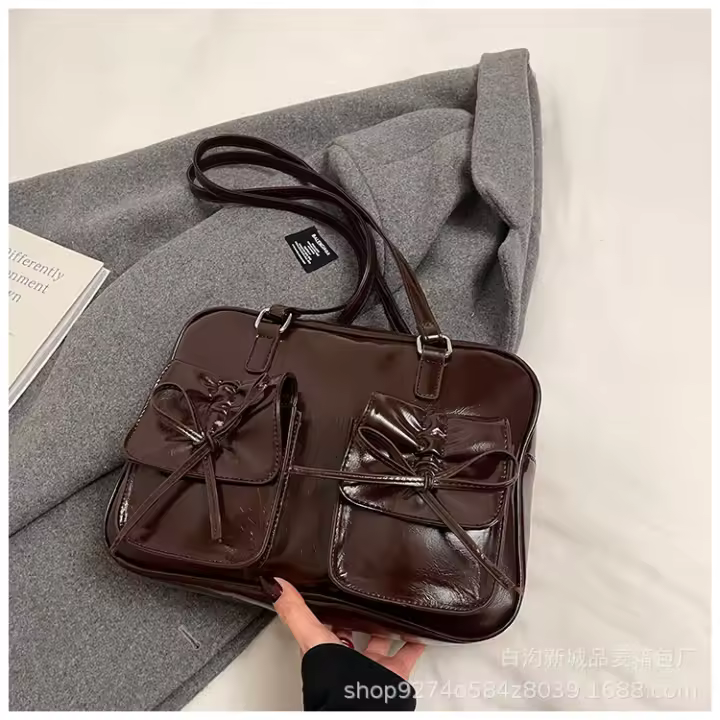 Bolso de mano para mujer con una sensación de alta gama, nuevo bolso de axila para ir al trabajo moderno y sencillo, mochila informal 2024 - 1