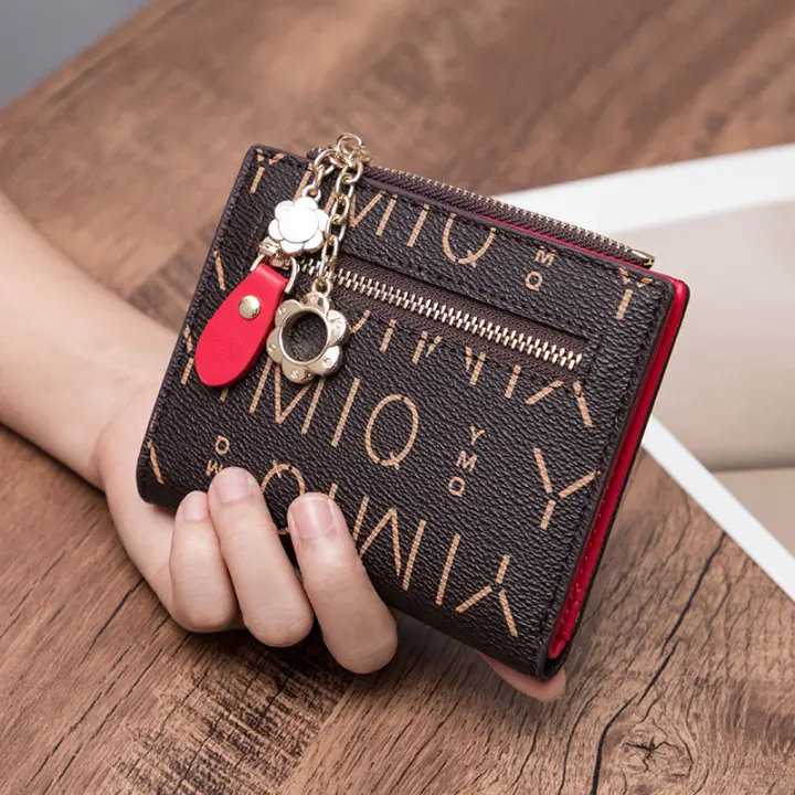 Cartera de cuero auténtico con sensación táctil para mujer 2025Nueva ranura para múltiples tarjetas Tarjetero corto multifunción de gran capacidad Bolso integrado para mujer Delgado - 1