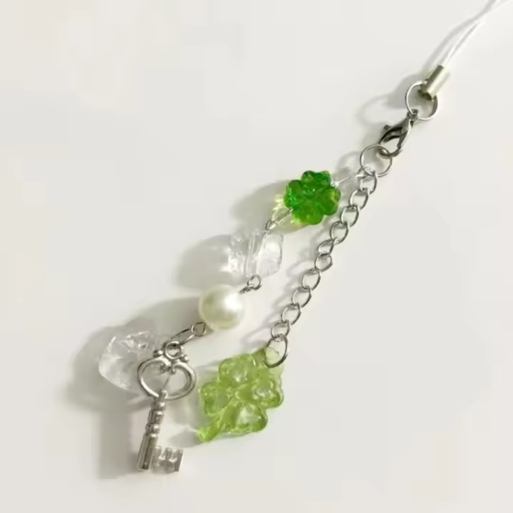 Cadena para teléfono de tréboles de cuatro hojas de la suerte, correa para la muñeca, cuentas antipérdida, colgante para teléfono, decoración de bolso, cordón Y2K hecho a mano para mujeres y niñas - 1