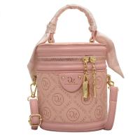 Textura de color sólido pequeña bolsa mujer 2025 nueva moda nicho portátil redondo cubo bolsa popular bolsa de mensajero - details 3