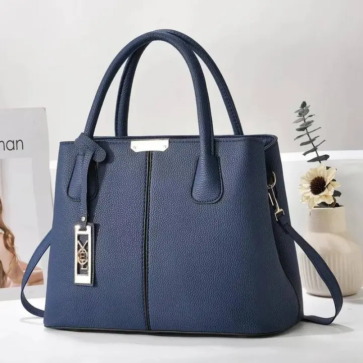 Bolso de mano de Color sólido a la moda para mamá de mediana edad, bolso de hombro sencillo e informal de gran capacidad, mochila de lujo de alta gama - 1