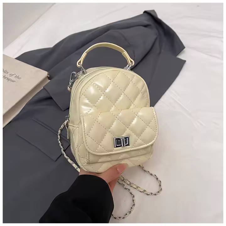 Versión coreana Xiaoxiangfeng Lingge mochila 2025 primavera nueva moda simple estudiante cadena de gama alta bolso de mujer - 1