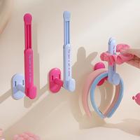 Estante de almacenamiento retráctil para cuerda para el cabello, soporte de papel higiénico montado en la pared sin perforaciones, ahorra espacio, collar de dopamina, soporte para pulsera, 2 uds. - details 3