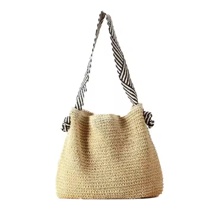 Nuevo bolso de paja, nuevo bolso tejido de hombro hecho a mano, bolso de mujer, bolso de playa versátil para vacaciones. - 1