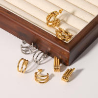 Aretes de Oro 18k de Lujo Ligero Diseño de Dos Cables con Acero Inoxidable Elegancia en Tus Oídos - details 0
