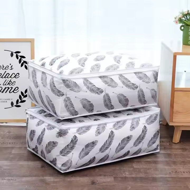 Bolsa de Almacenamiento Plegable para Edredones Diseño de Plumas Ideal para Ropa de Casa, Edredones, Fundas de Almohada Organizador de Equipaje de Viaje - 1