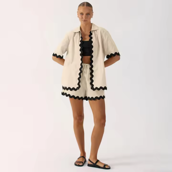 Conjunto de dos piezas de camisa de manga corta con botones y pantalones cortos holgados casuales de moda para mujer, primavera verano. - 1