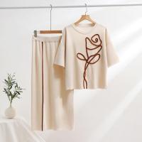 Conjunto de dos piezas para mujer, top de punto de manga corta holgado con cuello redondo abstracto simple de verano y falda recta a la cintura. - details 7