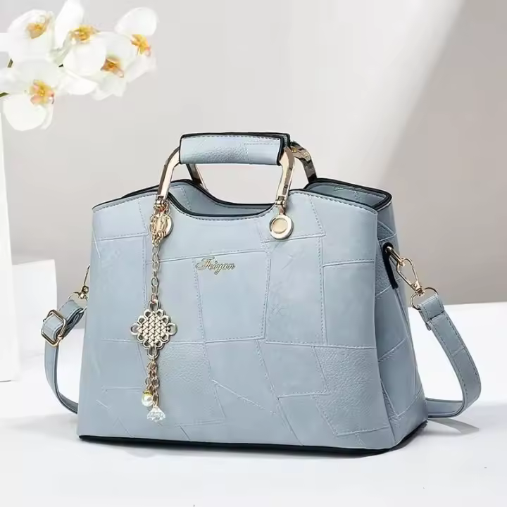 Bolso de mano para mujer de mediana edad, atmosférico, con temperamento de desplazamiento, bolso de mensajero de moda de gran capacidad, mochila de lujo de alta gama - 1