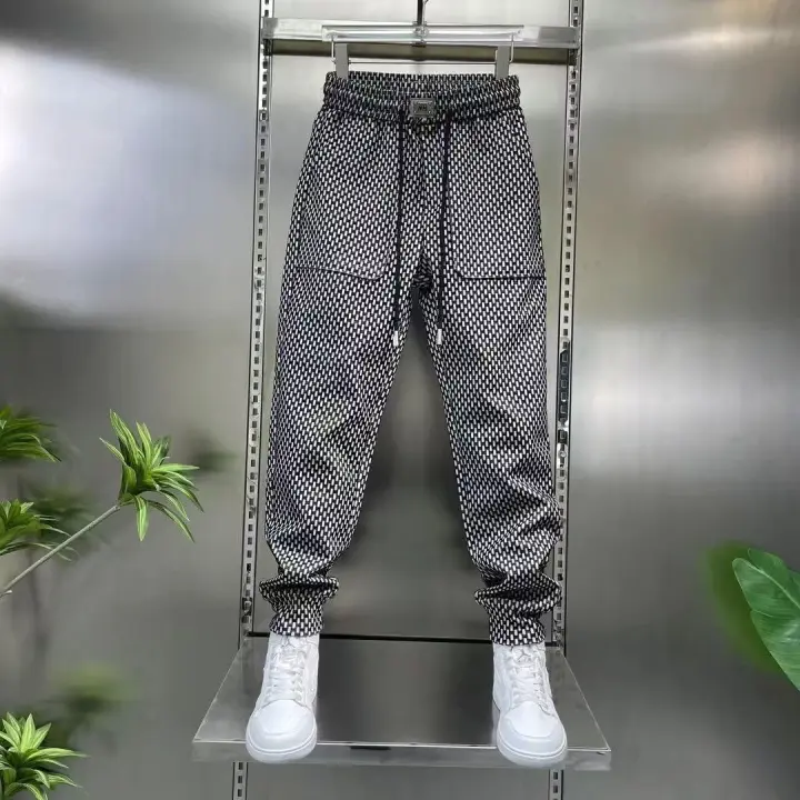 Pantalones informales de Jacquard para hombre, pantalón elástico, a la moda, versátil, transparente, pies pequeños, primavera 2025 - 1