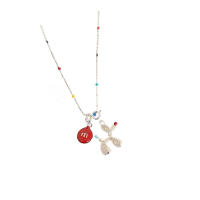 Lindo collar con colgante de perro con globo de frijol rojo para mujer 2025 nuevos accesorios de cadena de suéter de gama alta de primavera y verano - details 0