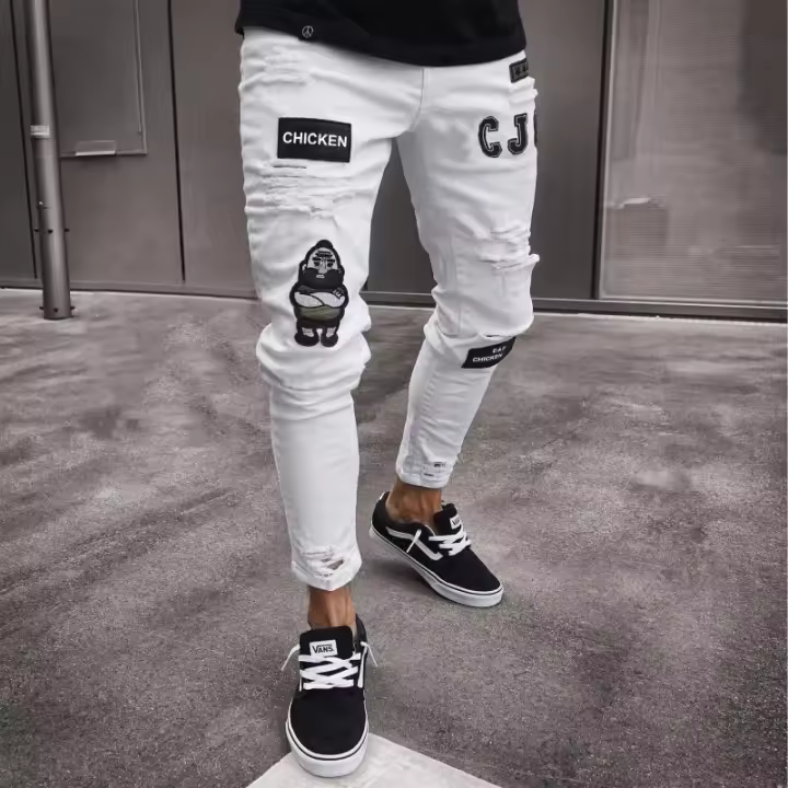 Vaqueros únicos de moda para hombre con bordado y rotura. - 1