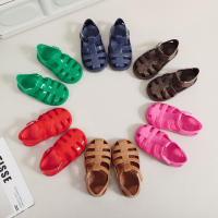 Sandalias con velcro para niños verano 2025 nuevo color sólido niños y niñas bolsa cabeza hueco suela suave bebé jalea sandalias - details 1