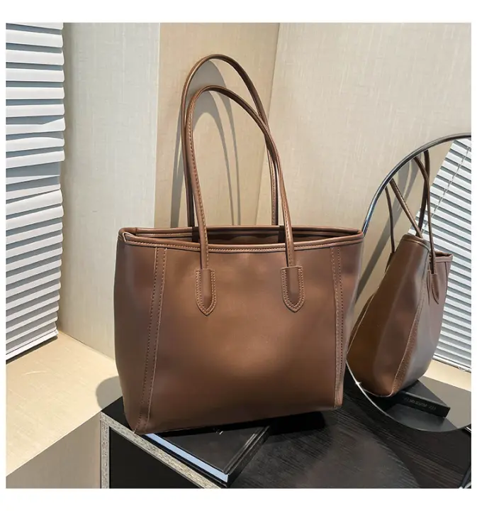 Bolso de mano con textura para desplazamientos atmosféricos, bolso de mano versátil a la moda con un solo hombro, tendencia, 2025 - 1