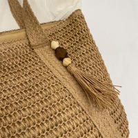 Bolso de hombro de diseño para mujer, bolsa de mano de gran capacidad hecha a mano con borla colgante, novedad de 2024 - details 12