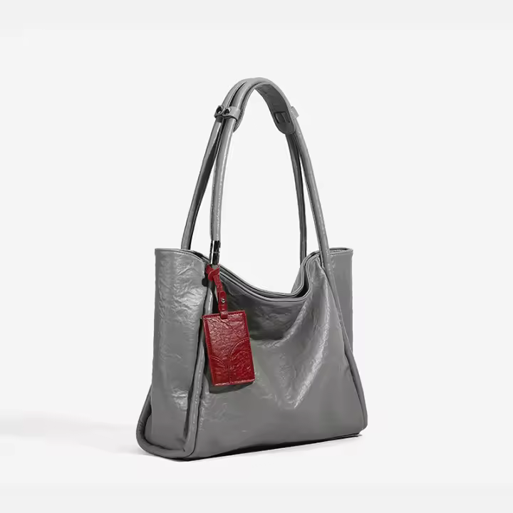 Bolso de mano de gran capacidad negro de cuero para mujer, nuevo bolso de hombro de primavera para viajeras, bolso grande para las axilas - 1